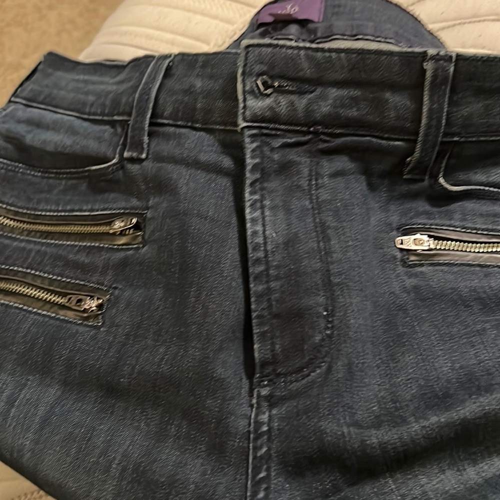 NYDJ jeans made with Lift Tuck and flatten in front and boost curves in back.